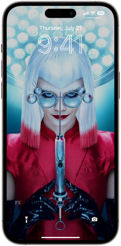 AHS: Delicate lock screen of a woman holding a needle with a spider in it
