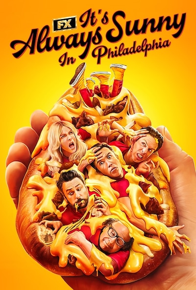 The Always Sunny cast crawling out of a large hotdog with ketchup and mustard.
