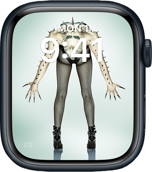 Apple Watch lock screen of person in heels and fishnet tights bending back with arms out from FX'S AHS NYC