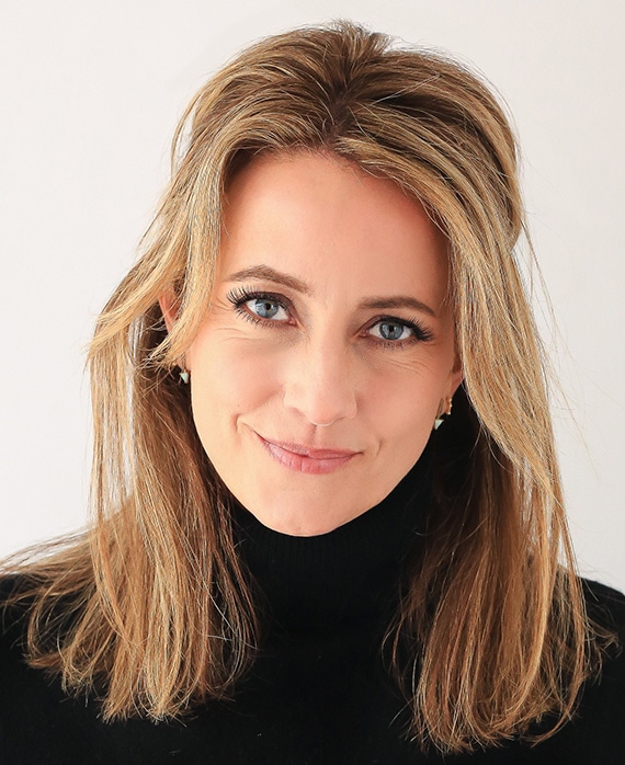 Julie DeJoie Headshot wearing a black turtle neck