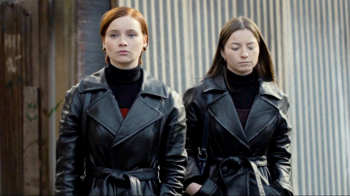 Hazel and Lola wearing matching black leather jackets