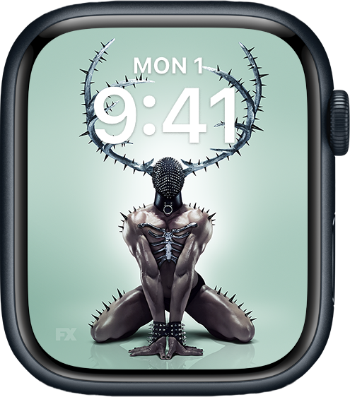 Apple Watch lock screen of muscular man on hands and knees wearing black mask and spiked antlers from FX'S AHS NYC
