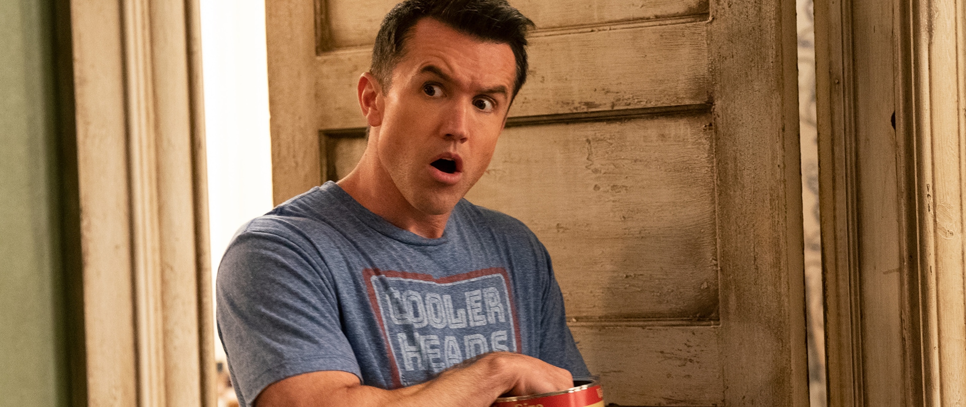 Rob McElhenney as Mac in FX's It's Always Sunny in Philadelphia with his hand in a can of nuts.