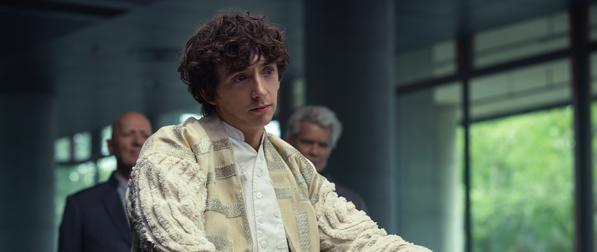 Close up of Boy Kavalier with Kirsh and Atom Eins in the background.