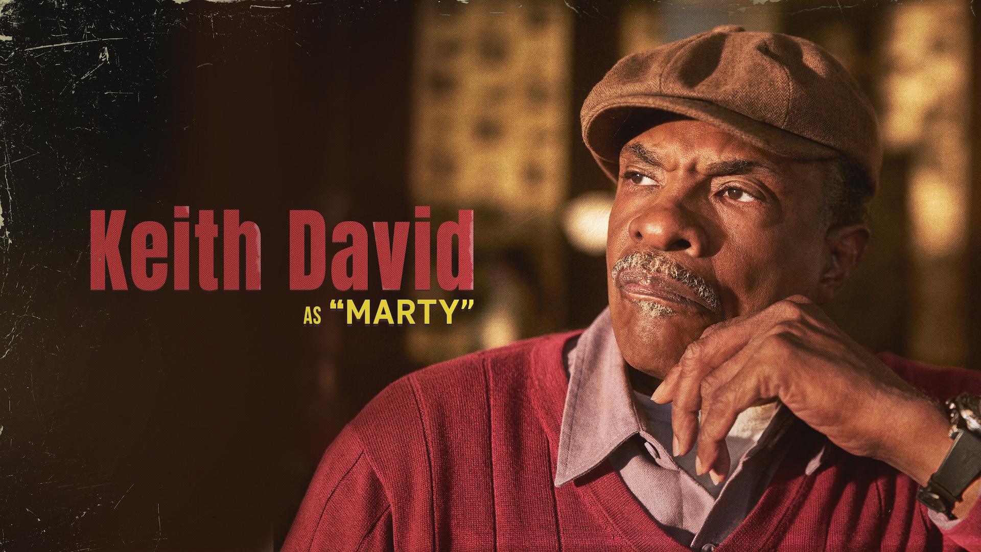Keith David as Marty in FX's The Lowdown, wearing a red and brown top, in a brown flat top hat.