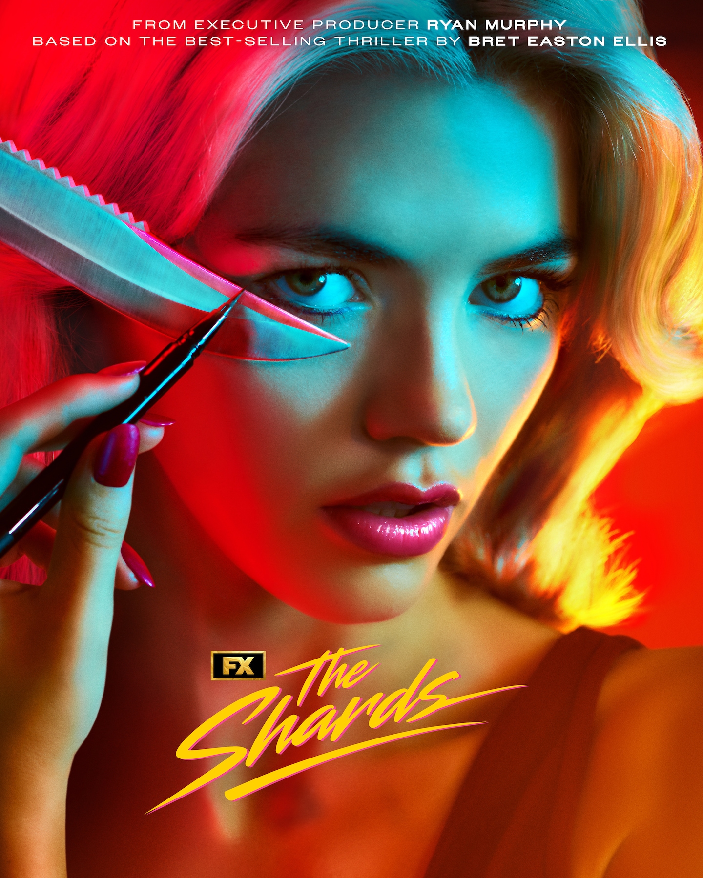 FX's The Shards Hayes Warner facing the camera while applying makeup with a knife and eyeliner
