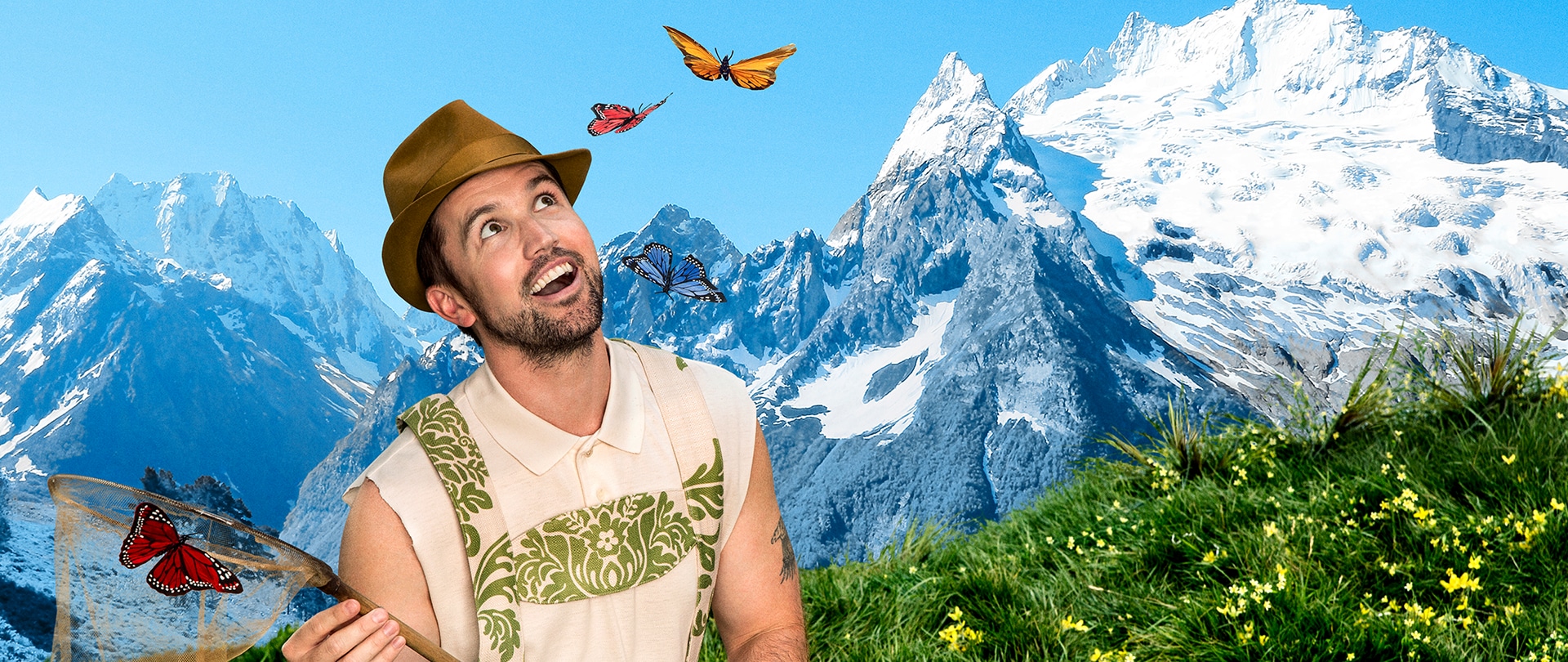 Rob McElhenney as Mac in the Swiss Alps holding a butterfly catcher wearing a green lederhosen and brown hat.