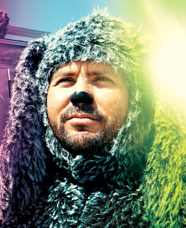 Jason Gann headshot wearing a dog costume 