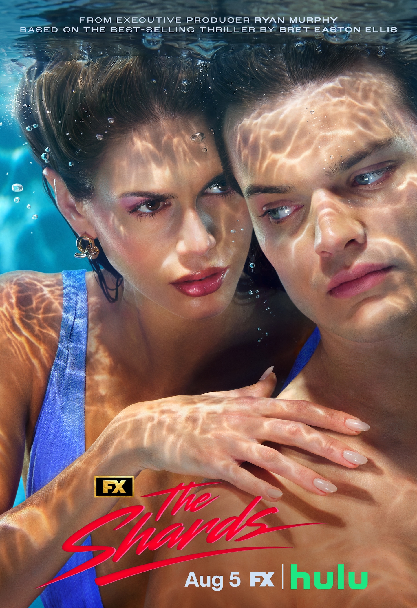 FX's The Shards Kaia Gerber and Homer Gere underwater in a swimming pool as Gerber wraps her arm around Gere.