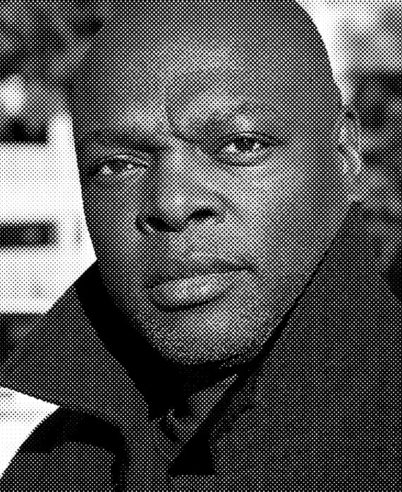 Charles Murray headshot with a black and while polka dot effect overlay