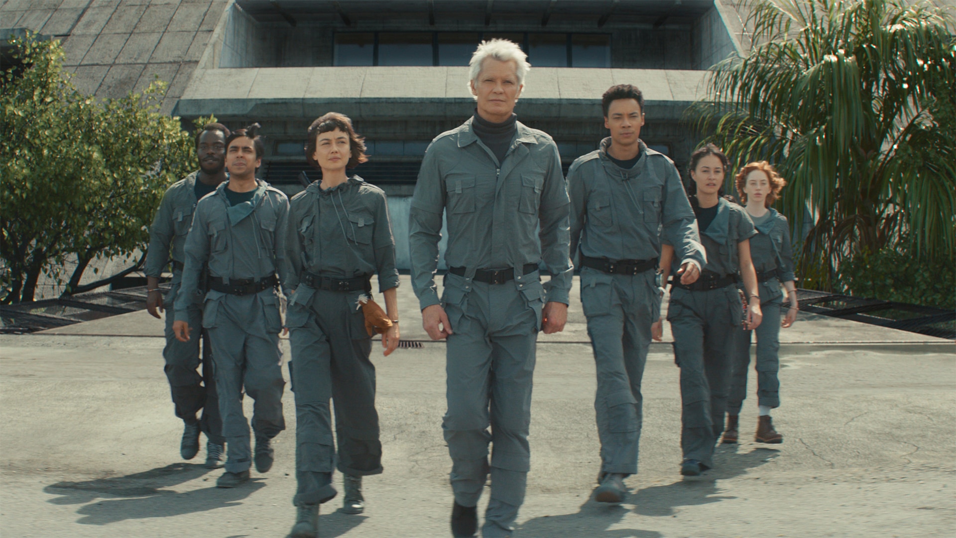 Kirsh and the Lost Boys walking in a triangle formation