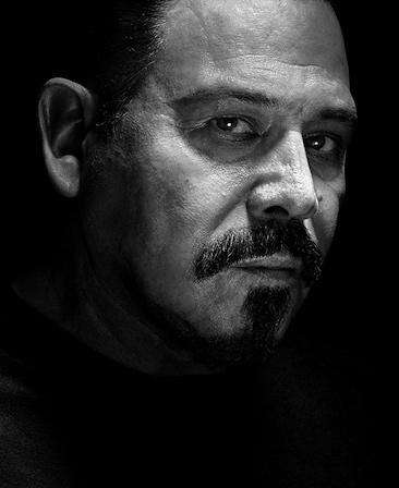 Emilio Rivera headshot fading into the background