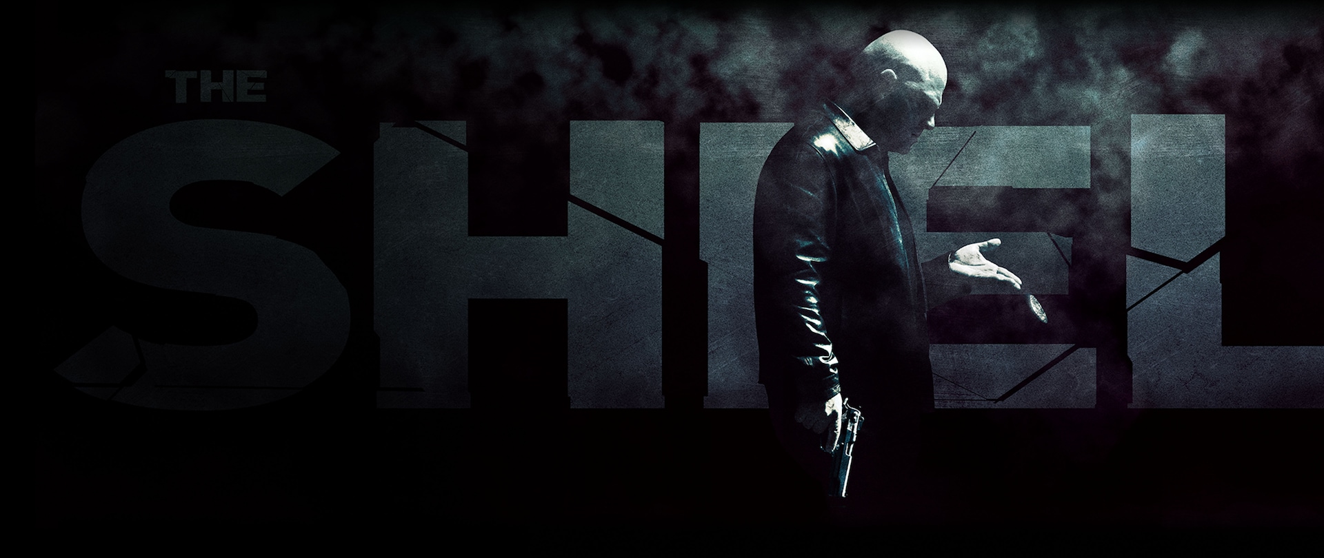 Side profile of Detective Mackey standing with a gun in one hand and his badge falling from the other for FX's The Shield
