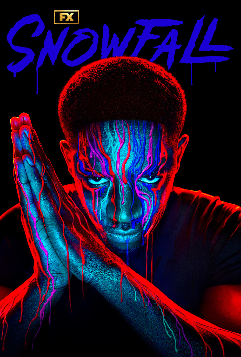 Close up of Franklin Saint with red, blue, and purple paint dripping down his face and hands	