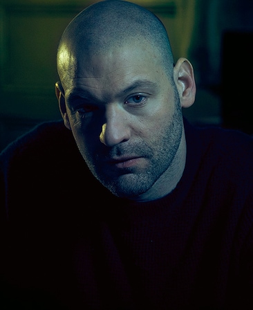 Corey Stoll Headshot wearing a black shirt