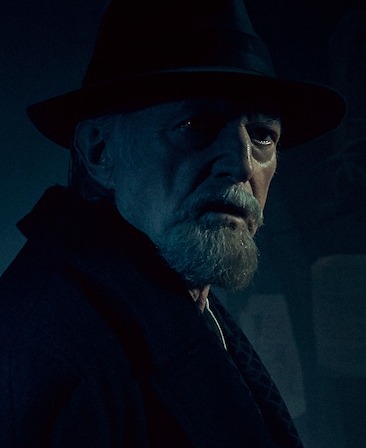 David Bradley Headshot wearing a hat and black jacket