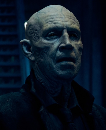 Jonathan Hyde Headshot with veins in his head and scars on his face