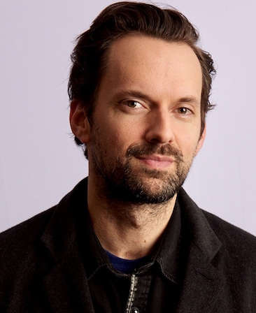 Micah Schraft headshot wearing a black jacket