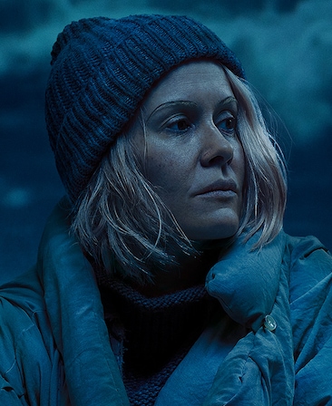 Headshot of Sarah Paulson with lined eyebrows and short blonde hair in beanie in FX's AHS Double Feature