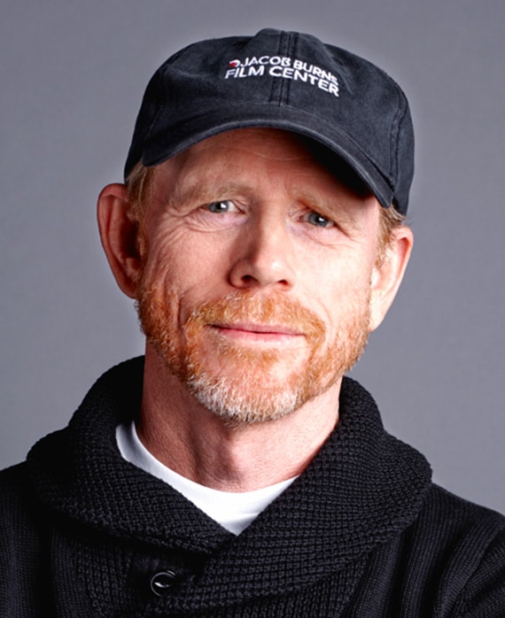 Ron Howard headshot wearing a black hoodie and a "Jacob Burns film Center" baseball cap