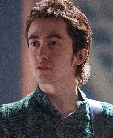 Christian Lees headshot wearing a green shirt 