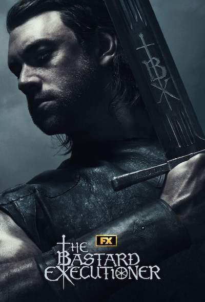 Man in black leather battle garment looking down holding sword against his face
