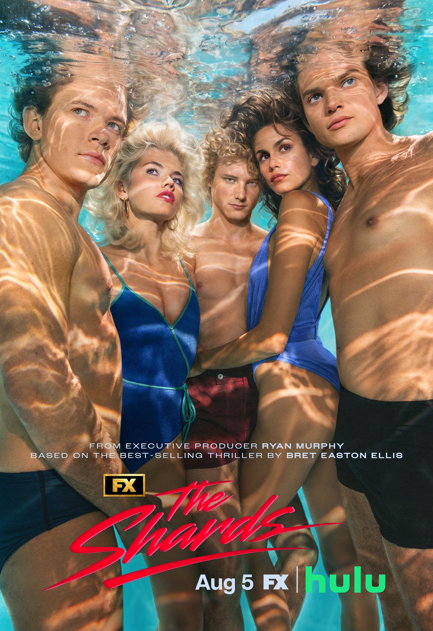 FX's The Shards full cast, underwater in a pool wearing blue, red and black swimsuits.