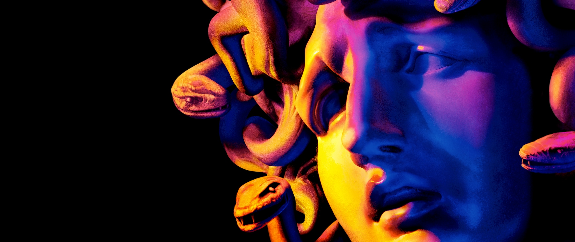 Greek mythology stone head of Medusa with hues of purple, orange and yellow for FX's The Assassination of Gianni Versace