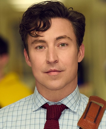 Brian Jordan Alvarez as Evan Marquez for FX's English Teacher, wearing white patterned button up and red tie.